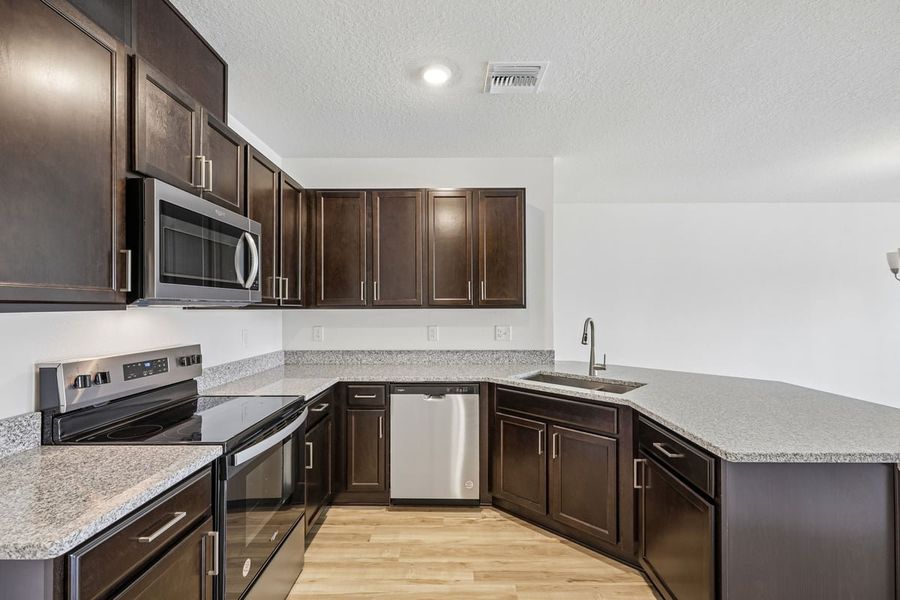 Furnished interior view inside a new home in Reserve at Forest Lake Townhomes, Lake Wales (Image 5). Furnished interior view inside a new home in Reserve at Forest Lake Townhomes, Lake Wales (Image 5).