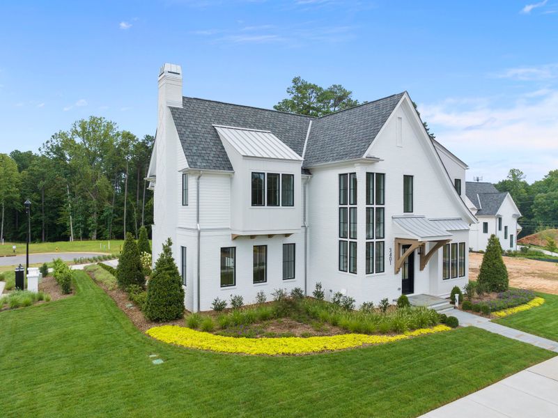 Representative exterior photo of a completed home built from the Abigail by Homes by Dickerson in The Founding at Blue Ridge, Raleigh, NC (Image 2). Representative exterior photo of a completed home built from the Abigail by Homes by Dickerson in The Founding at Blue Ridge, Raleigh, NC (Image 2).