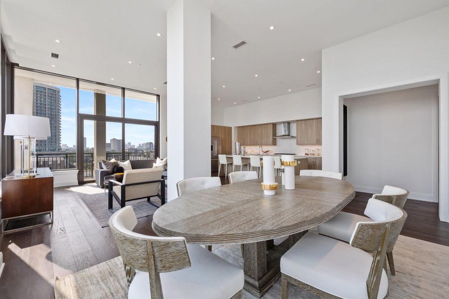 Dining room has views to the south and connects easily to the living room and kitchen.  The space can accommodate dining sets of various styles and sizes.  Spaces measures 18 x 11.