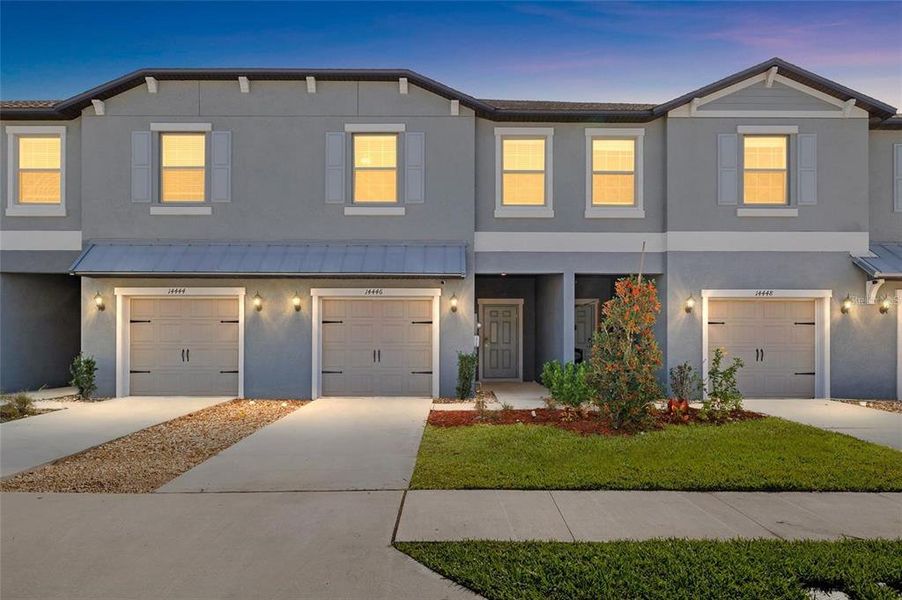 Front exterior of a new home in , Ruskin, FL, highlighting curb appeal (Image 26).