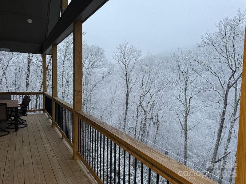 ENJOY THE WINTER VIEWS FROM YOUR COVERED DECK WITH A NICE CUP OF HOT CHOCHOLATE