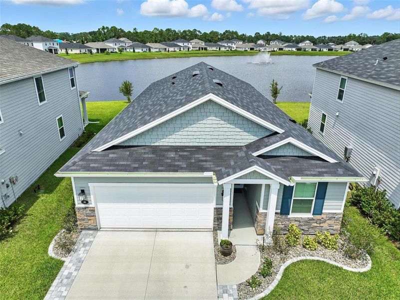 Front exterior of a new home in , Palm Coast, FL, highlighting curb appeal (Image 1).