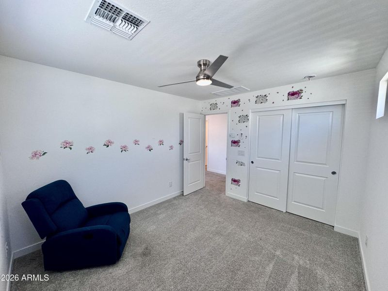 Bright Carpeted Bedroom