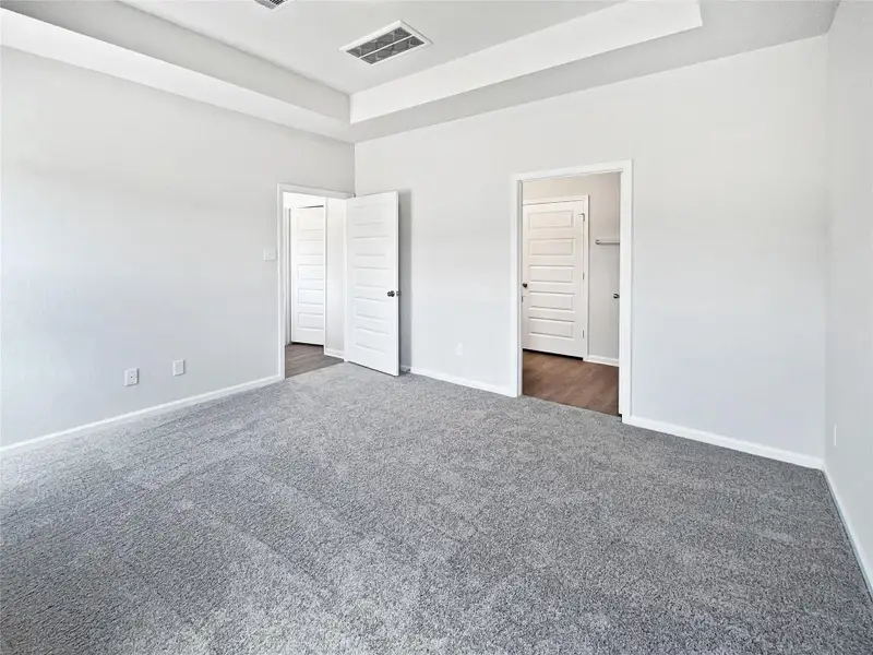 The Blue Jay II- Primary Bedroom. Home under construction, photo used for illustrative purposes only, colors and options will vary.