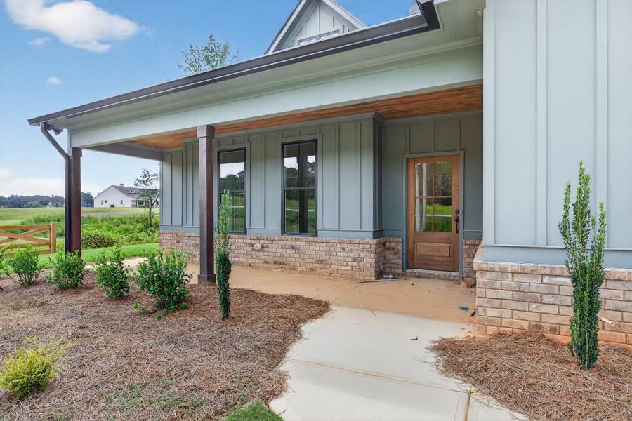 Front exterior of a new home in , Dallas, GA, highlighting curb appeal (Image 21).