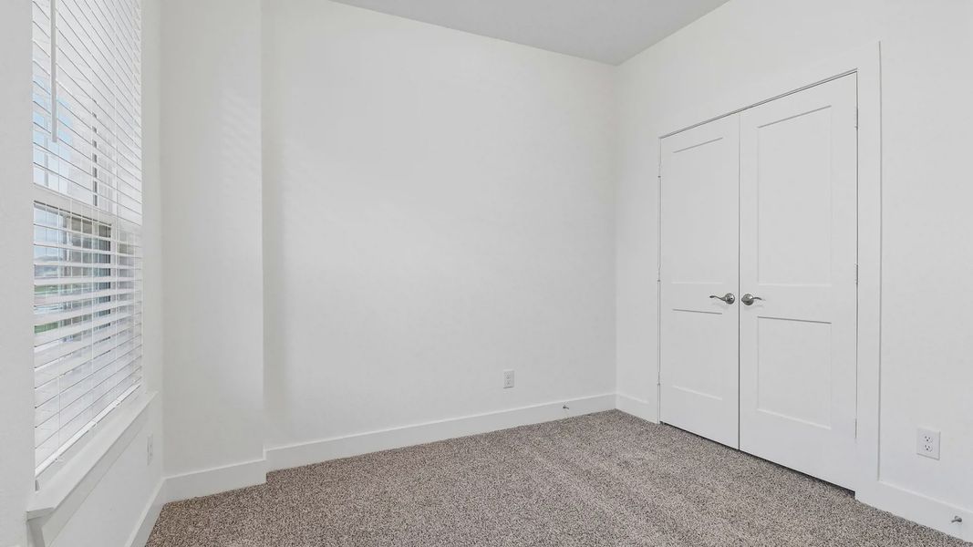 Spacious, unfurnished interior of a new home in Meridiana Townhomes, Manvel (Image 35).