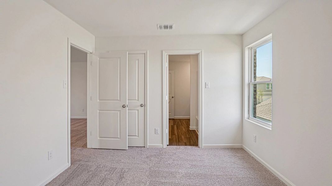 Representative unfurnished interior of a home built from the Pioneer by Starlight Homes in Avalon Ridge, Cut and Shoot (Image 24).