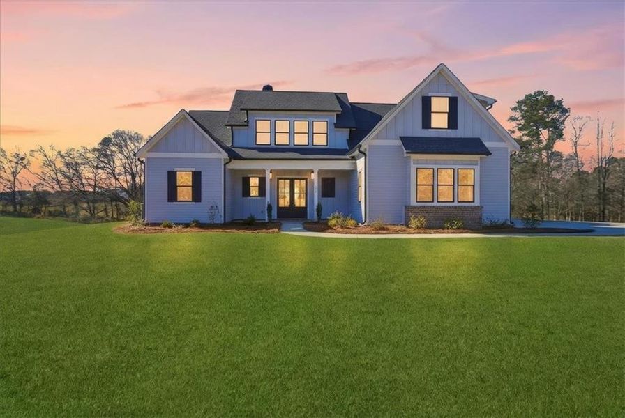 Front exterior of a new home in Old Town Estates, Dacula, GA, highlighting curb appeal (Image 27).