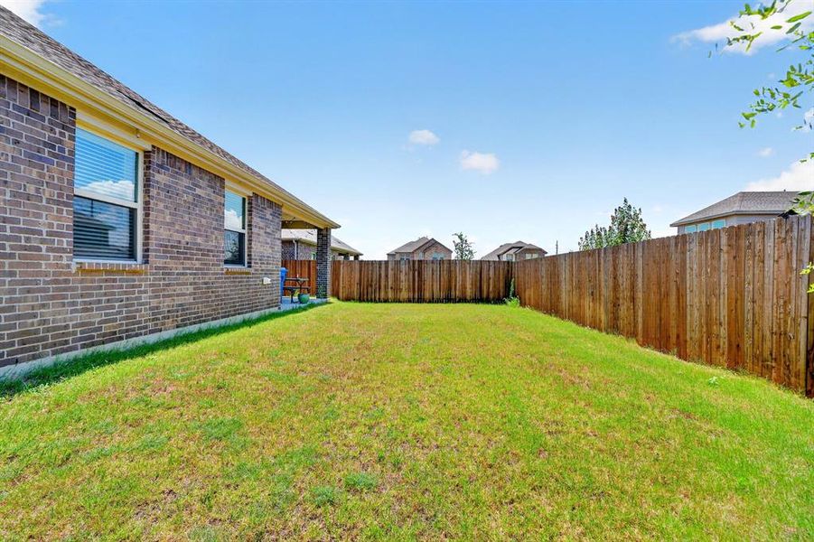 Exterior details and patio area of a home in , Aubrey (Image 19). Exterior details and patio area of a home in , Aubrey (Image 19).