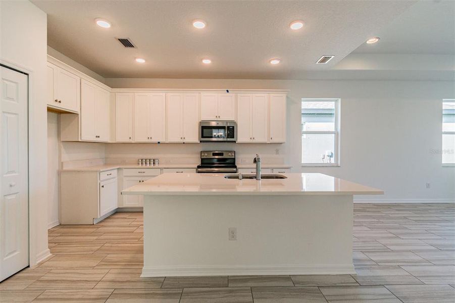 Furnished interior view inside a new home in The Hammocks at West Port, Port Charlotte (Image 4). Furnished interior view inside a new home in The Hammocks at West Port, Port Charlotte (Image 4).