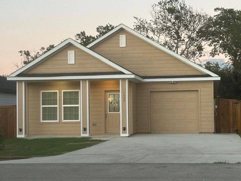 View of front of home with a garage