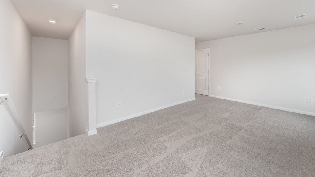 Representative unfurnished interior of a home built from the WREN by D.R. Horton in Sidbury Station, Castle Hayne (Image 17).
