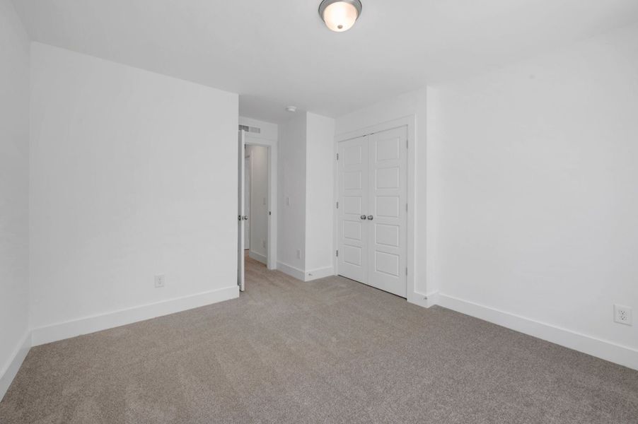 Spacious, unfurnished interior of a new home in Ashmore Townes, Garner (Image 24).