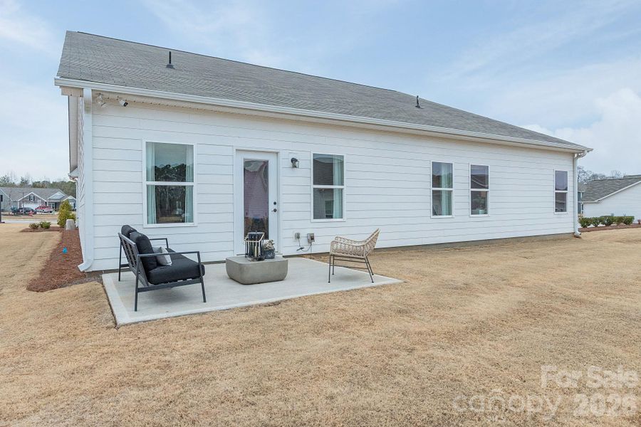 Exterior details and patio area of a home in Pine Bluff, Midland (Image 24).