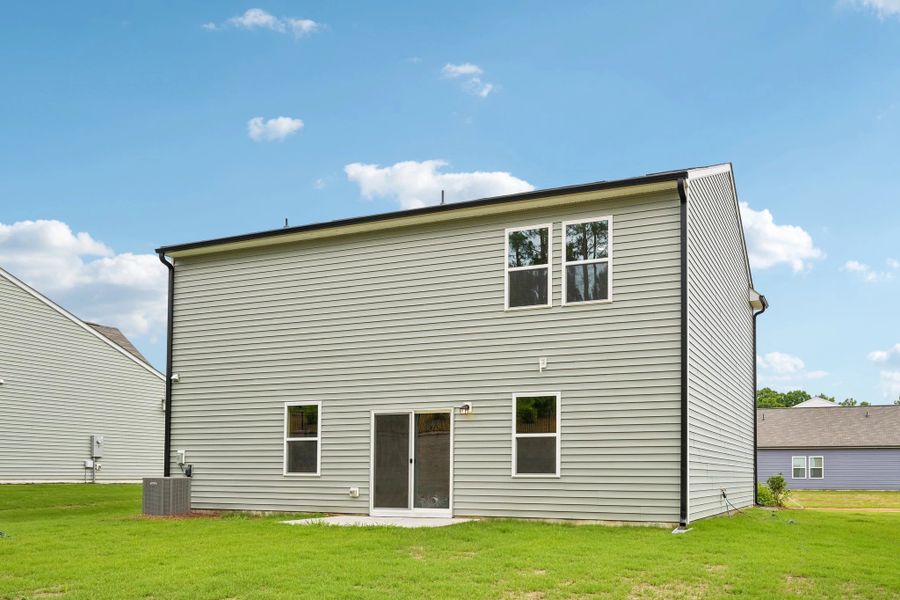 Exterior details and patio area of a home in Middleton Farms, Middlesex (Image 24).