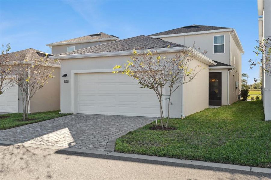 Front exterior of a new home in , Winter Garden, FL, highlighting curb appeal (Image 30).