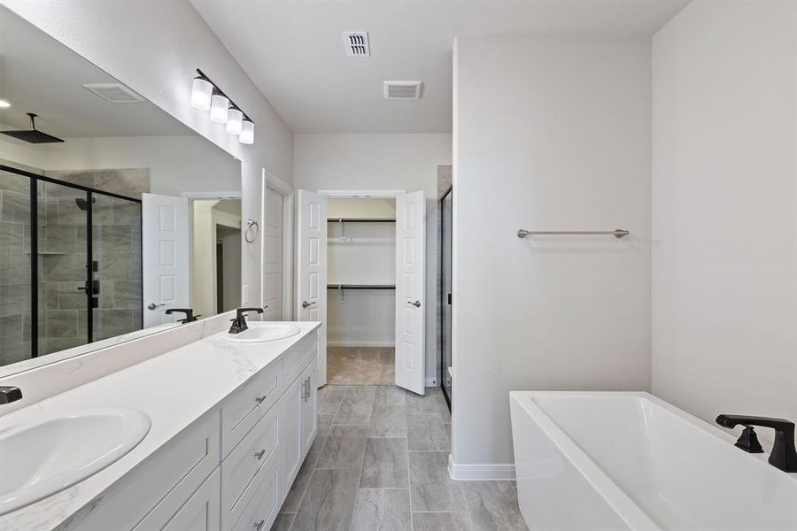 Plenty of space for two in this lovey owner's bath!