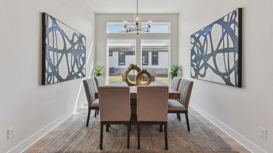Representative furnished interior of a home built from the Garet by Chesmar Homes in Feathergrass, Florence (Image 10).