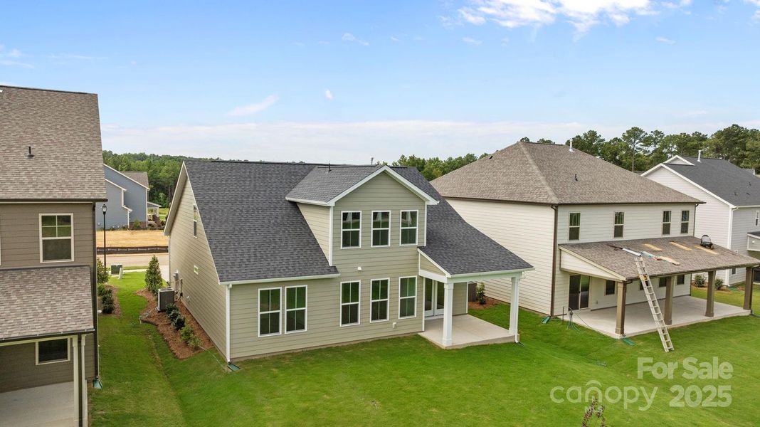 Front exterior of a new home in Lakeside Glen, York, SC, highlighting curb appeal (Image 1). Front exterior of a new home in Lakeside Glen, York, SC, highlighting curb appeal (Image 1).