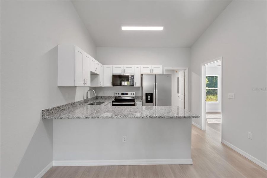 Furnished interior view inside a new home in , Williston (Image 18).