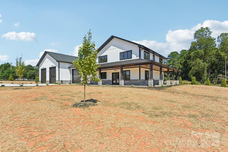 Front exterior of a new home in , Mooresville, NC, highlighting curb appeal (Image 28). Front exterior of a new home in , Mooresville, NC, highlighting curb appeal (Image 28).