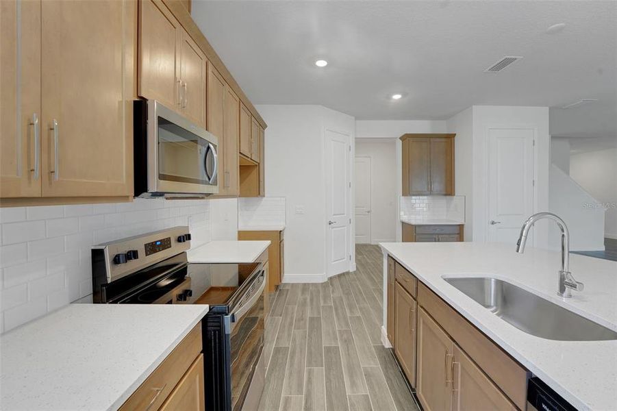 Furnished interior view inside a new home in Angeline, Land O' Lakes (Image 7).