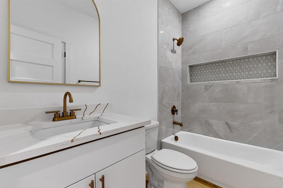 Bathroom with washtub / shower combination and vanity Bathroom with washtub / shower combination and vanity