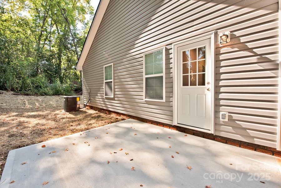 Front exterior of a new home in , Concord, NC, highlighting curb appeal (Image 15). Front exterior of a new home in , Concord, NC, highlighting curb appeal (Image 15).