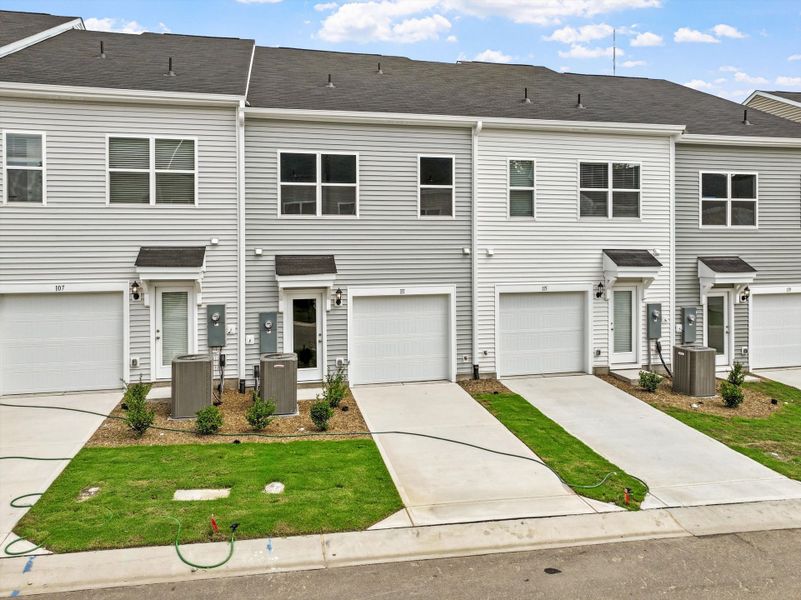 Front exterior of a new home in Renaissance at White Oak, Garner, NC, highlighting curb appeal (Image 20).