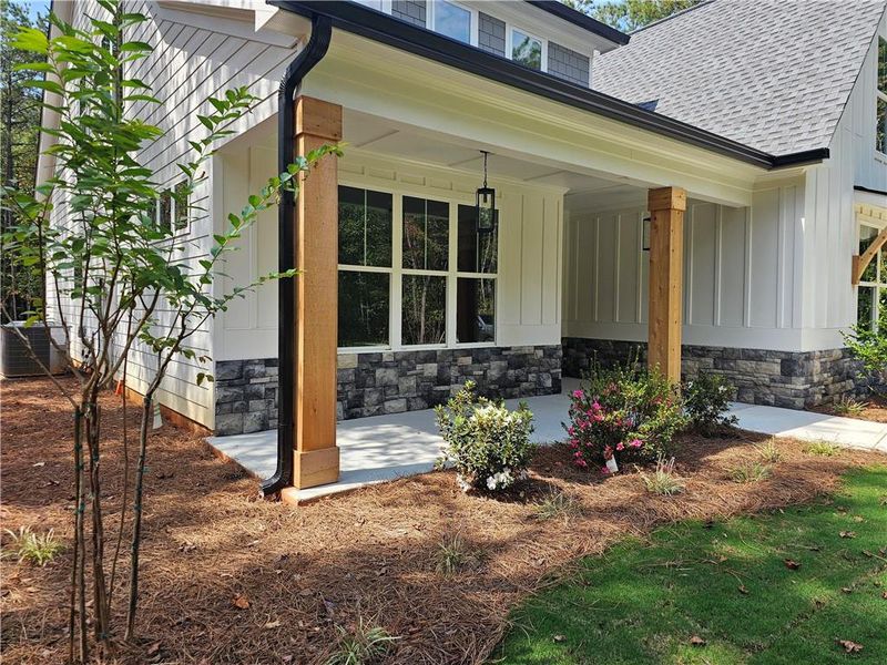 Front exterior of a new home in , Douglasville, GA, highlighting curb appeal (Image 1).
