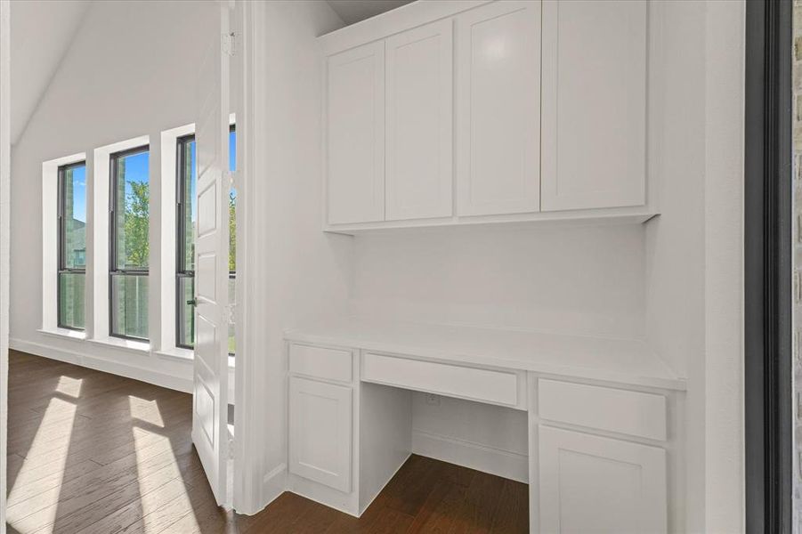 Detailed view of wood finished floors and baseboards