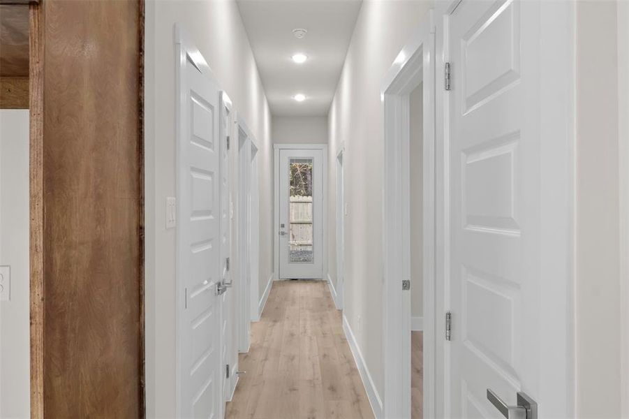 Hall with light wood-type flooring