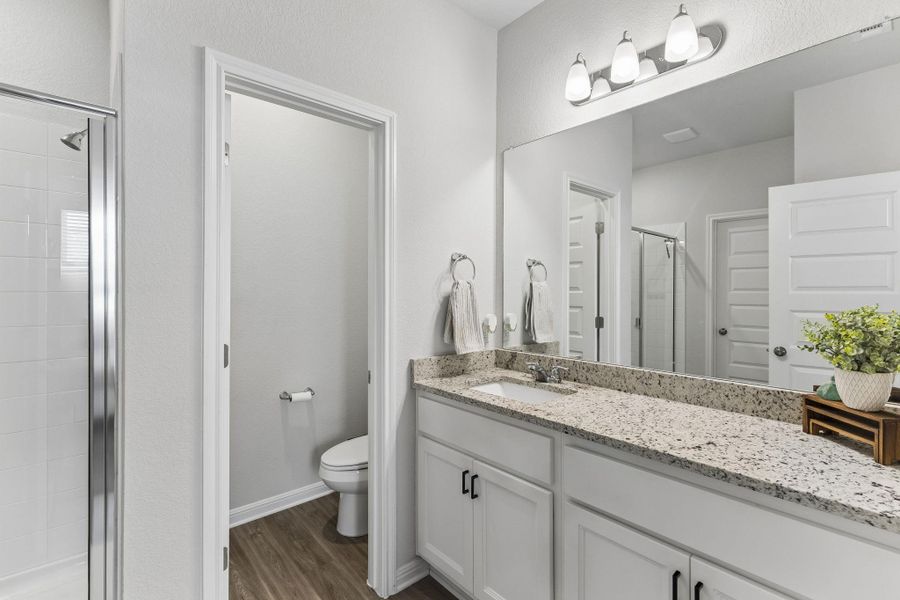 Furnished interior view inside a new home in Stallion Run, Buda (Image 14).