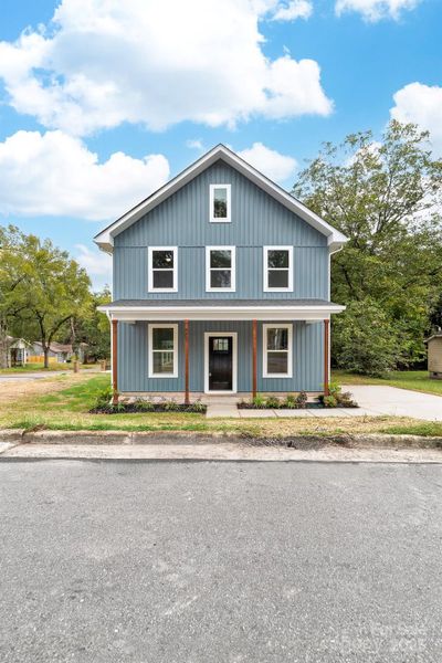 Front exterior of a new home in , Shelby, NC, highlighting curb appeal (Image 24).