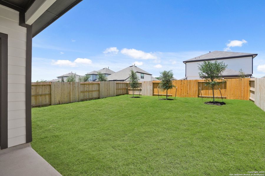 Front exterior of a new home in Timber Creek, San Antonio, TX, highlighting curb appeal (Image 22).
