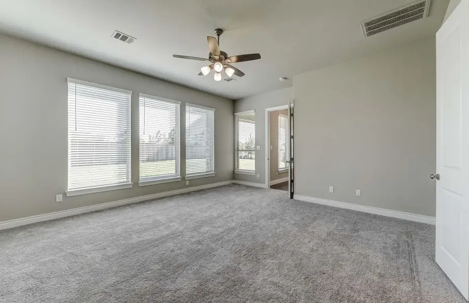 Representative unfurnished interior of a home built from the 3798 by Ravenna Homes in The Woodlands Hills 65′, Willis (Image 34).