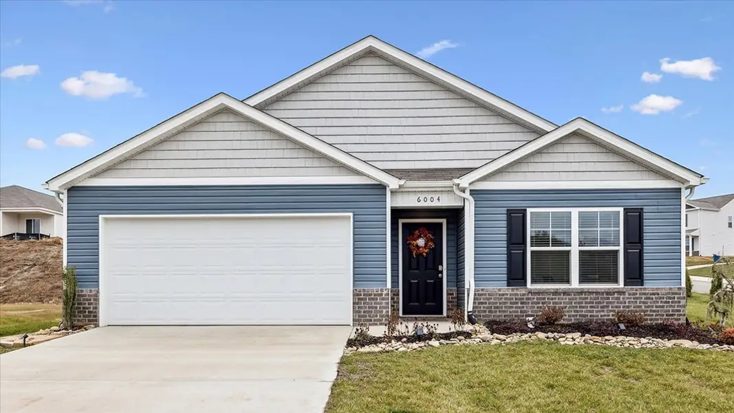 Representative exterior photo of a completed home built from the Cali by D.R. Horton in Mary's Pointe, Clinton, TN (Image 1). Representative exterior photo of a completed home built from the Cali by D.R. Horton in Mary's Pointe, Clinton, TN (Image 1).