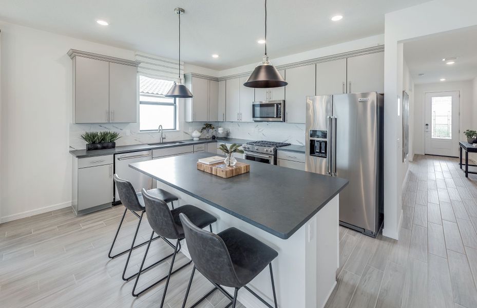Furnished interior view inside a new home in Cedar Grove at The Woodlands, North Port (Image 10).