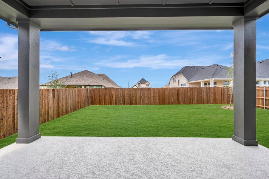 Exterior details and patio area of a home in Tavolo Park Cottages, Fort Worth (Image 4).