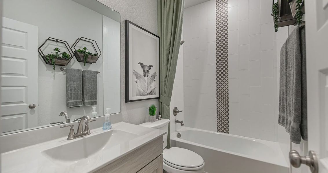 Representative furnished interior of a home built from the Andrew by Chesmar Homes in Meyer Ranch, New Braunfels (Image 11).