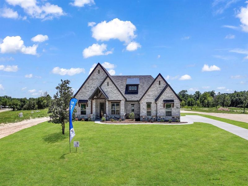 Front exterior of a new home in , Weatherford, TX, highlighting curb appeal (Image 24). Front exterior of a new home in , Weatherford, TX, highlighting curb appeal (Image 24).
