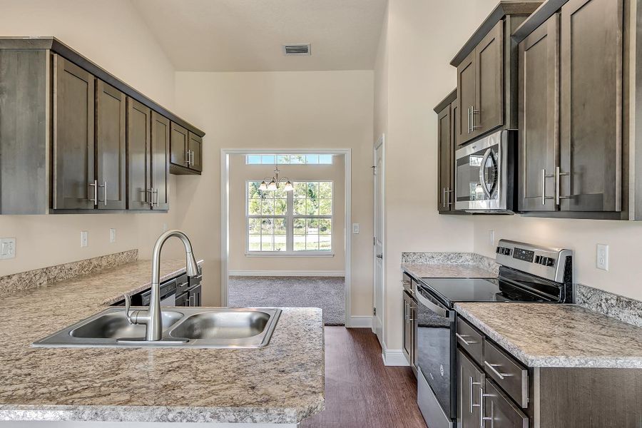 Furnished interior view inside a new home in Spring Hill, Spring Hill (Image 5).