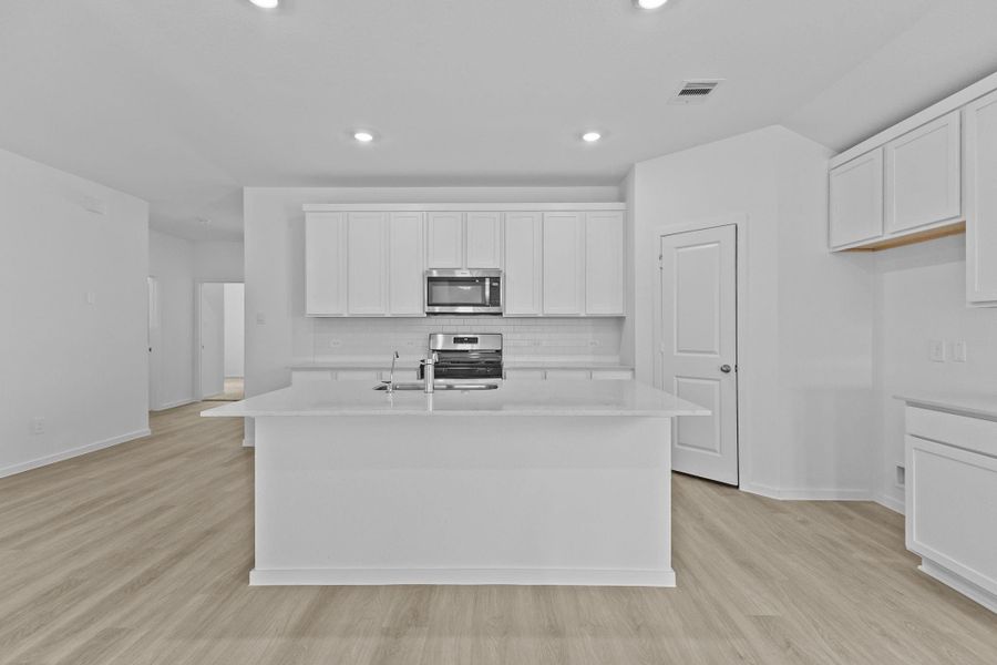 Furnished interior view inside a new home in Sunterra Lakes, Brookshire (Image 12). Furnished interior view inside a new home in Sunterra Lakes, Brookshire (Image 12).