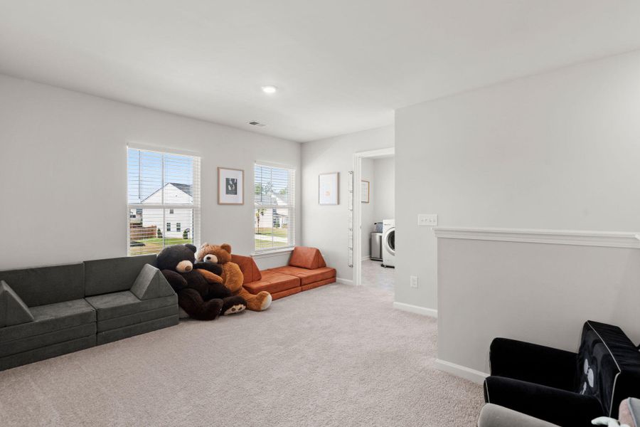 Furnished interior view inside a new home in Lindera Preserve at Cane Bay Plantation, Summerville (Image 21).
