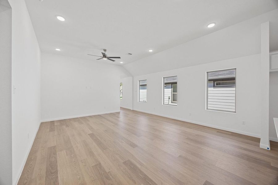 Living Area in the Cypress home plan by Trophy Signature Homes – REPRESENTATIVE PHOTO