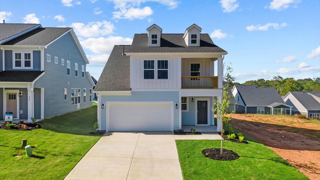 Representative exterior photo of a completed home built from the Freesia by DRB Homes in Spring Branch, Smyrna, TN (Image 21).