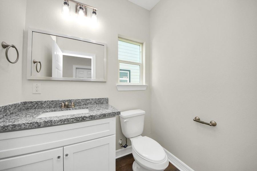 The first-floor half bathroom offers a practical and stylish space, easily accessible for guests and family while blending seamlessly with the home’s overall design - (representation photo).