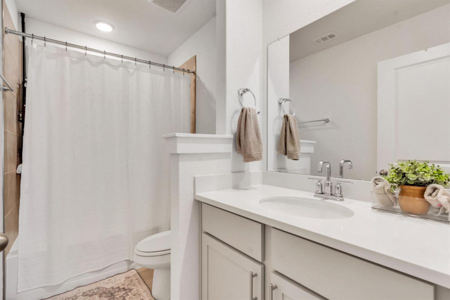 Furnished interior view inside a new home in Crosswinds, Kyle (Image 8).