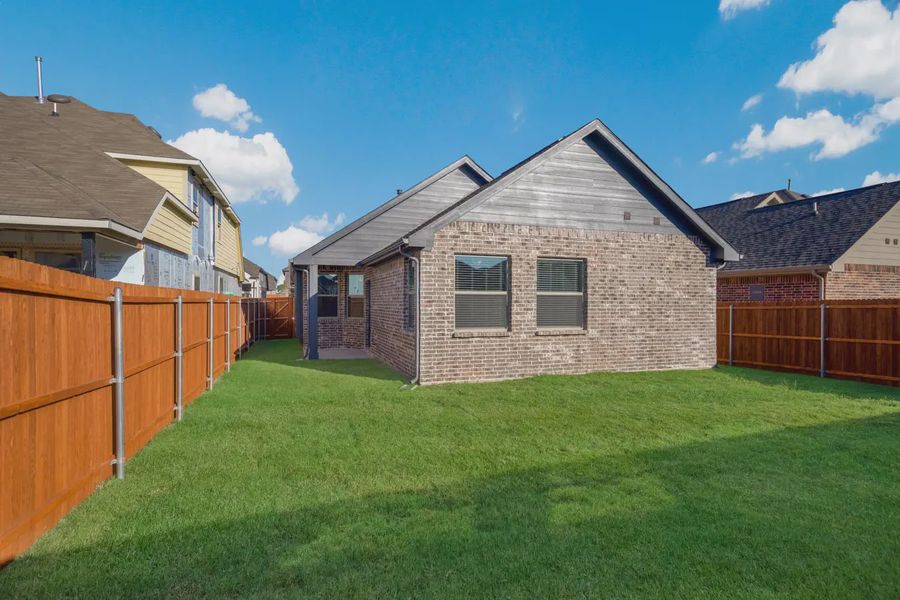 Representative exterior details of a home built from the Charleston by Chesmar Homes in Stillwater Ranch, Buda (Image 3).