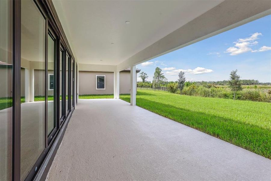 Exterior details and patio area of a home in Two Rivers, Zephyrhills (Image 3).